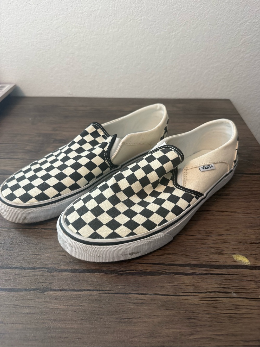 Vans Men Checkerboard Slip-On Sneakers in Black and White